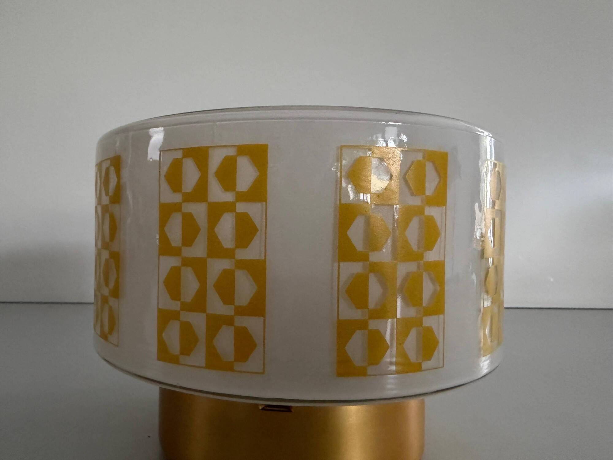 Ceiling light or wall sconce in opal glass with yellow decorations by VEB, 1950s, Germany.
