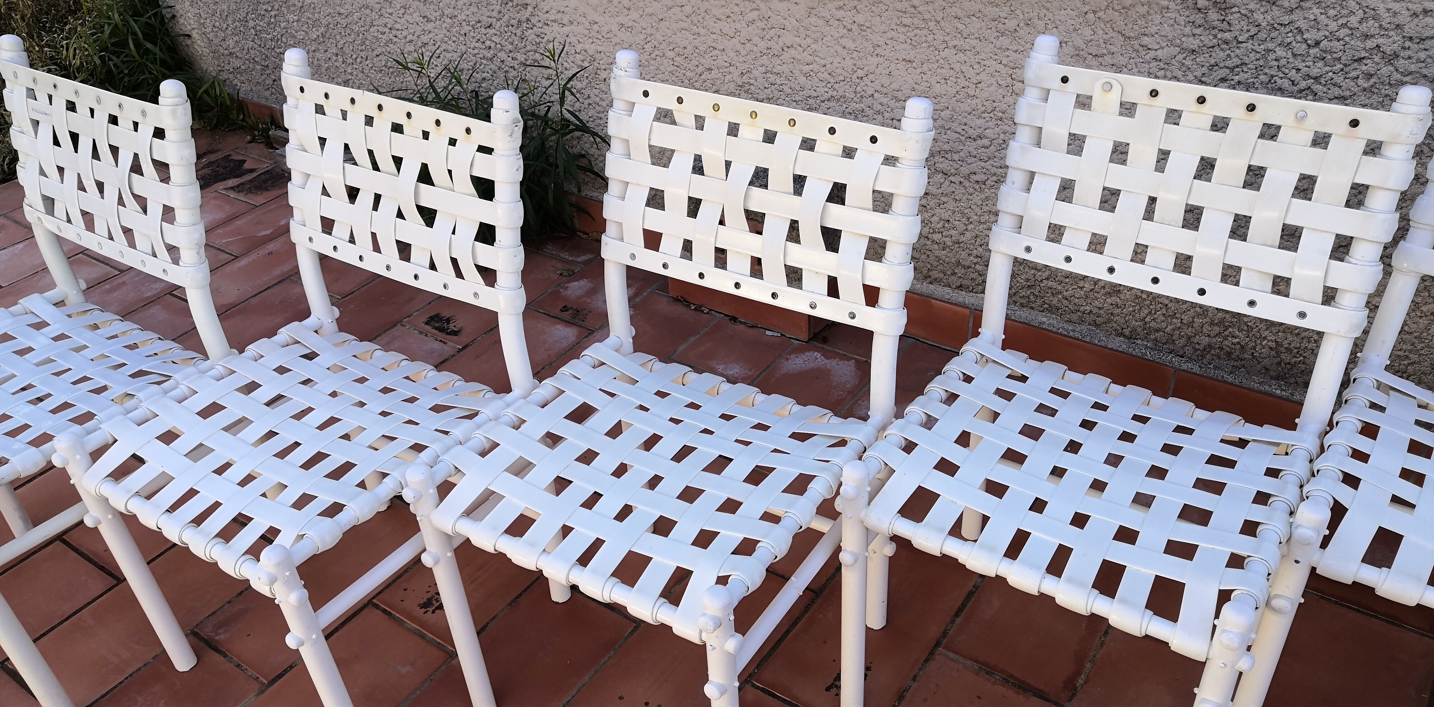 Suite de 7 chaises tressées triconfort vintage