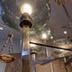 Timeless modern Scandinavian / mid-century chandelier in chrome and smoked glass.