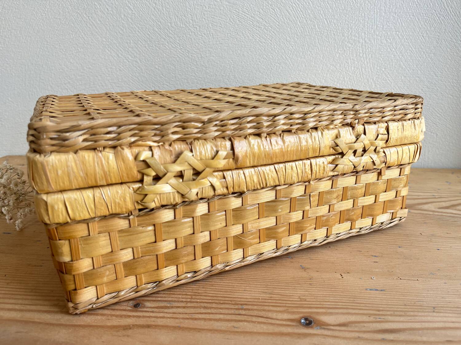 Vintage woven wicker suitcase