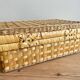 Vintage woven wicker suitcase