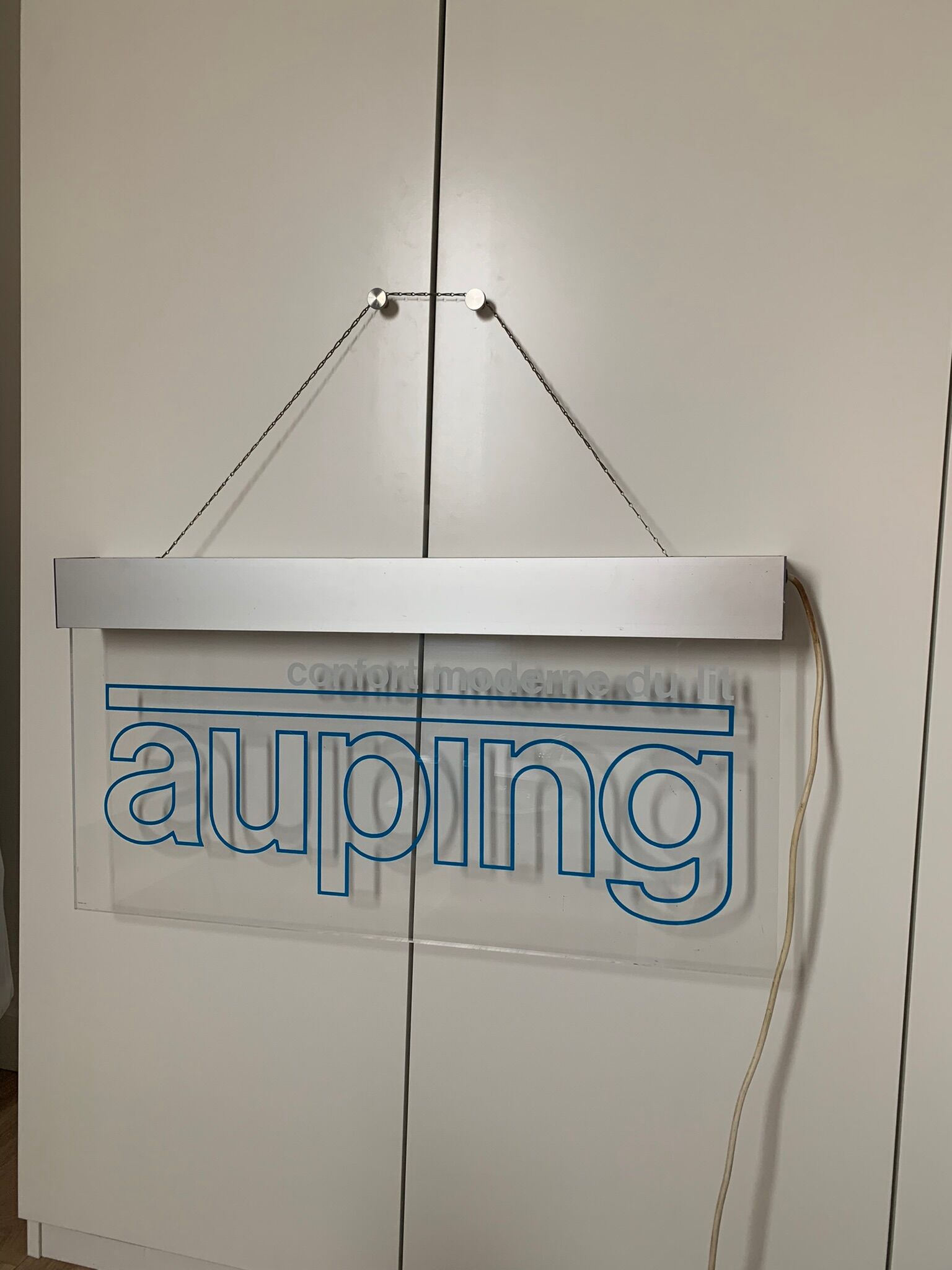 Illuminated vintage advertising sign