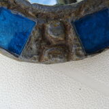 Mirror in metal and blue glass