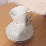 2 coffee cups and saucers