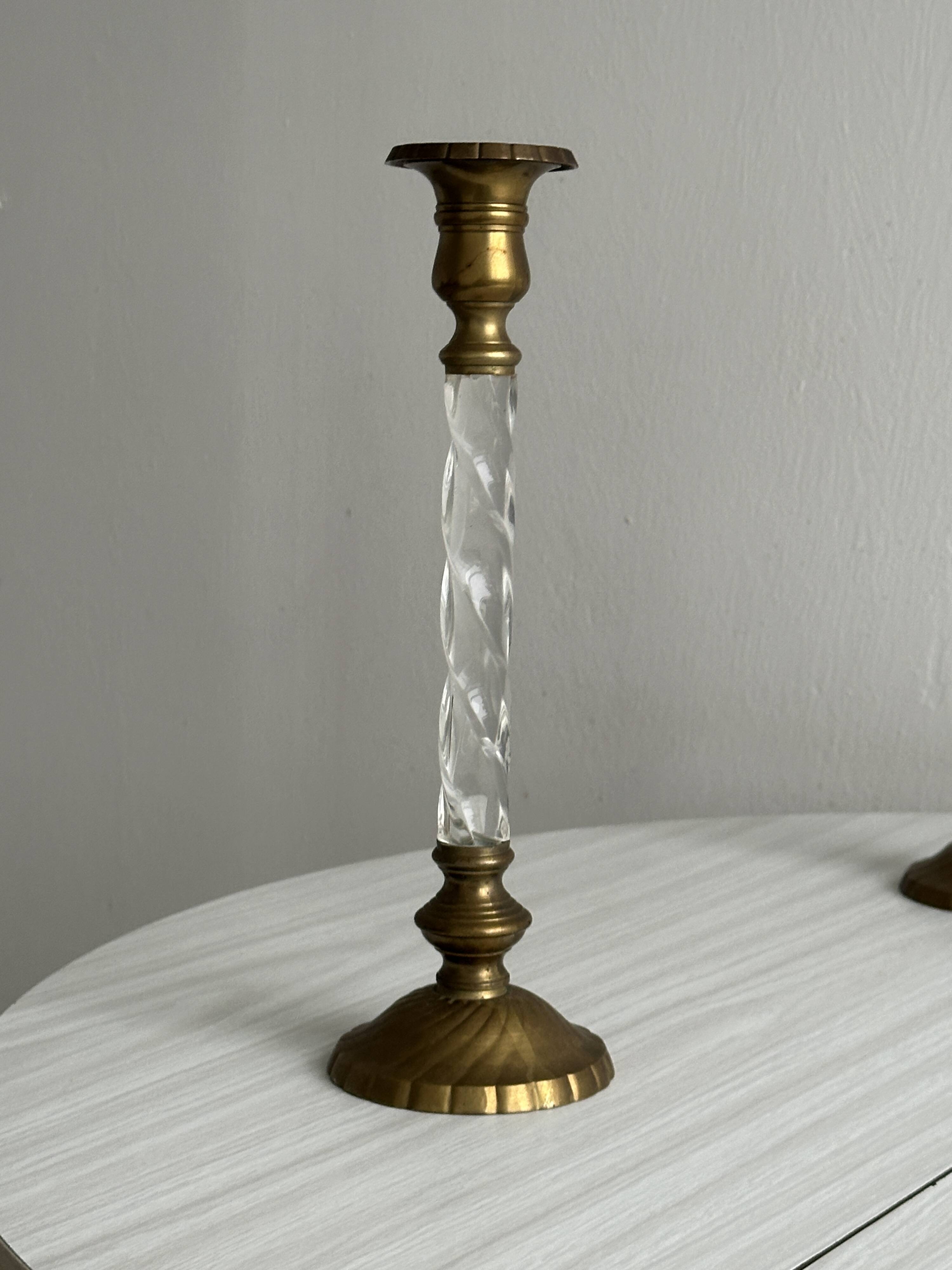 Pair of twisted metal and glass candlesticks