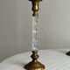 Pair of twisted metal and glass candlesticks