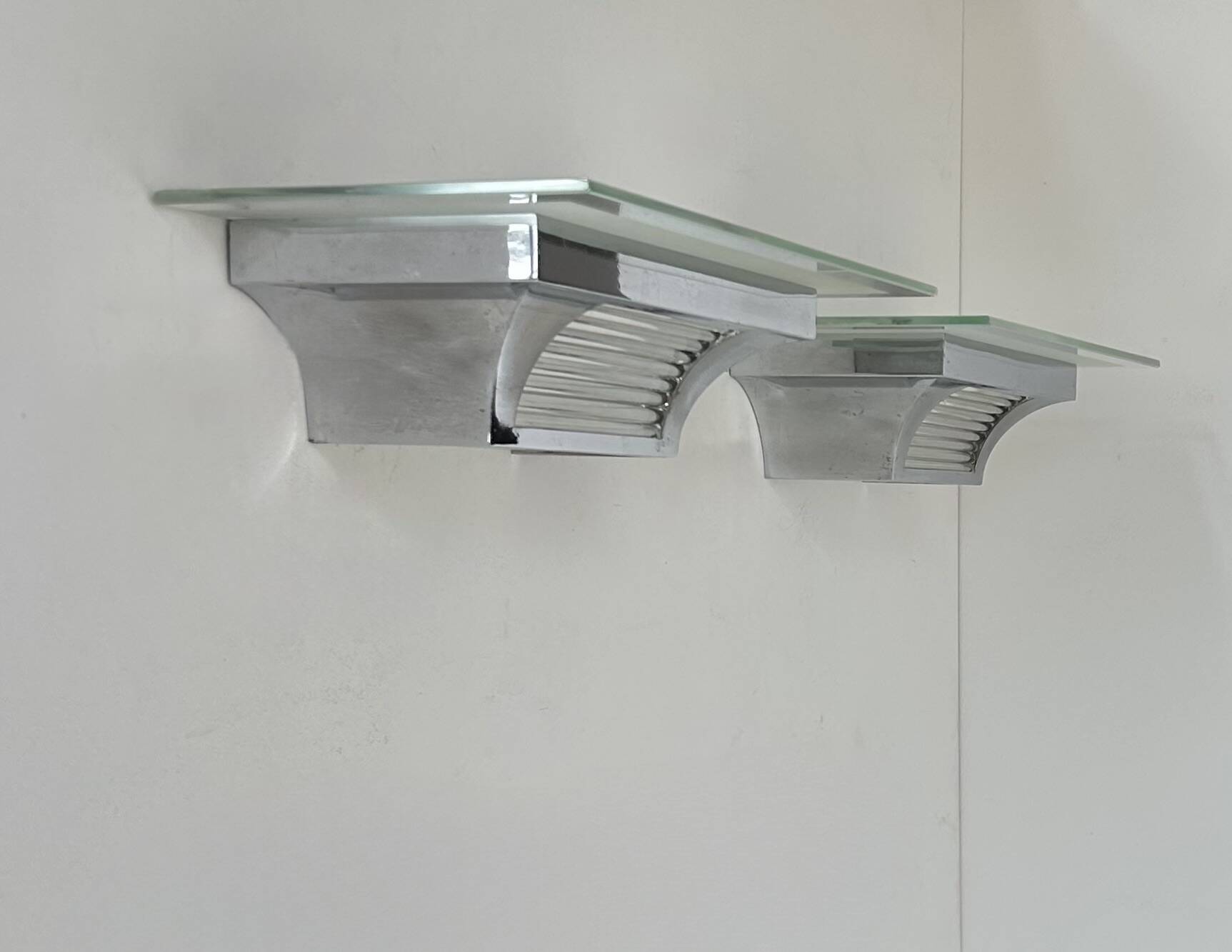 Pair of modernist Henri Petitot wall lights, chrome-plated brass, France, 1930