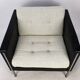 Pair of armchairs by Pierre Paulin for Artifort, black leather and cream fabric.