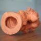 Sculpture signed Doloire, terracotta sculpture with 3 faces, candlestick sculpture, collection, interior decoration.
