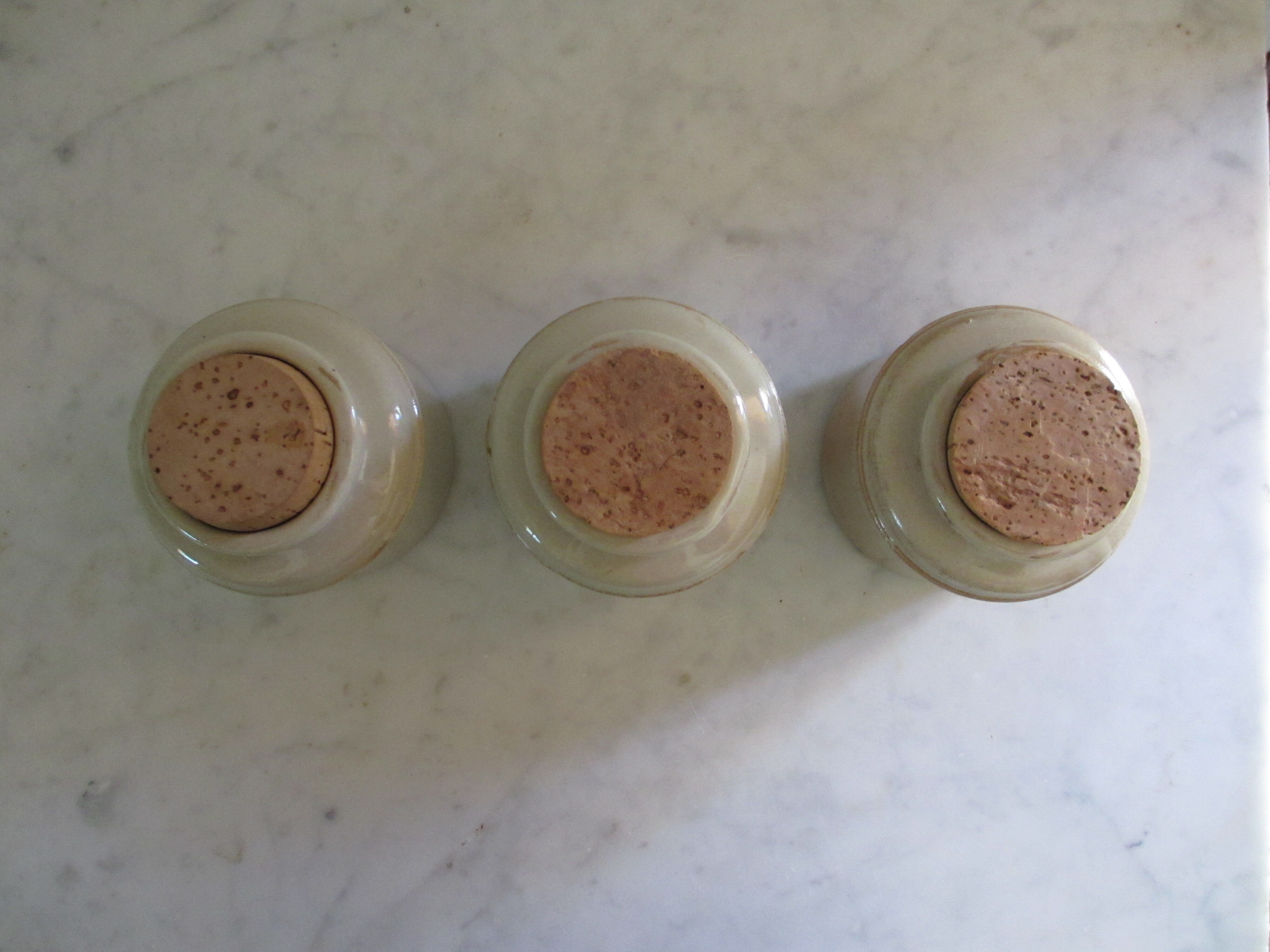 Series of three spice pots in sandstone