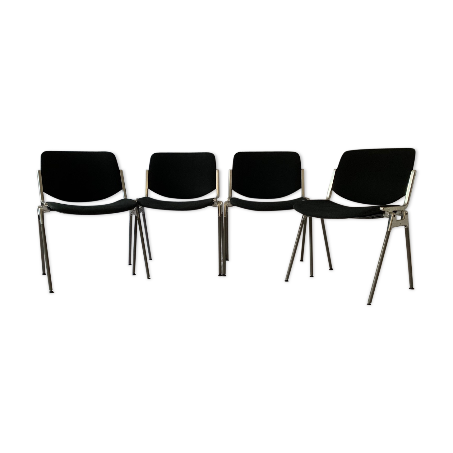 A set of four Castelli DSC 106 chairs, designed by G. Piretti, Italy, 90s