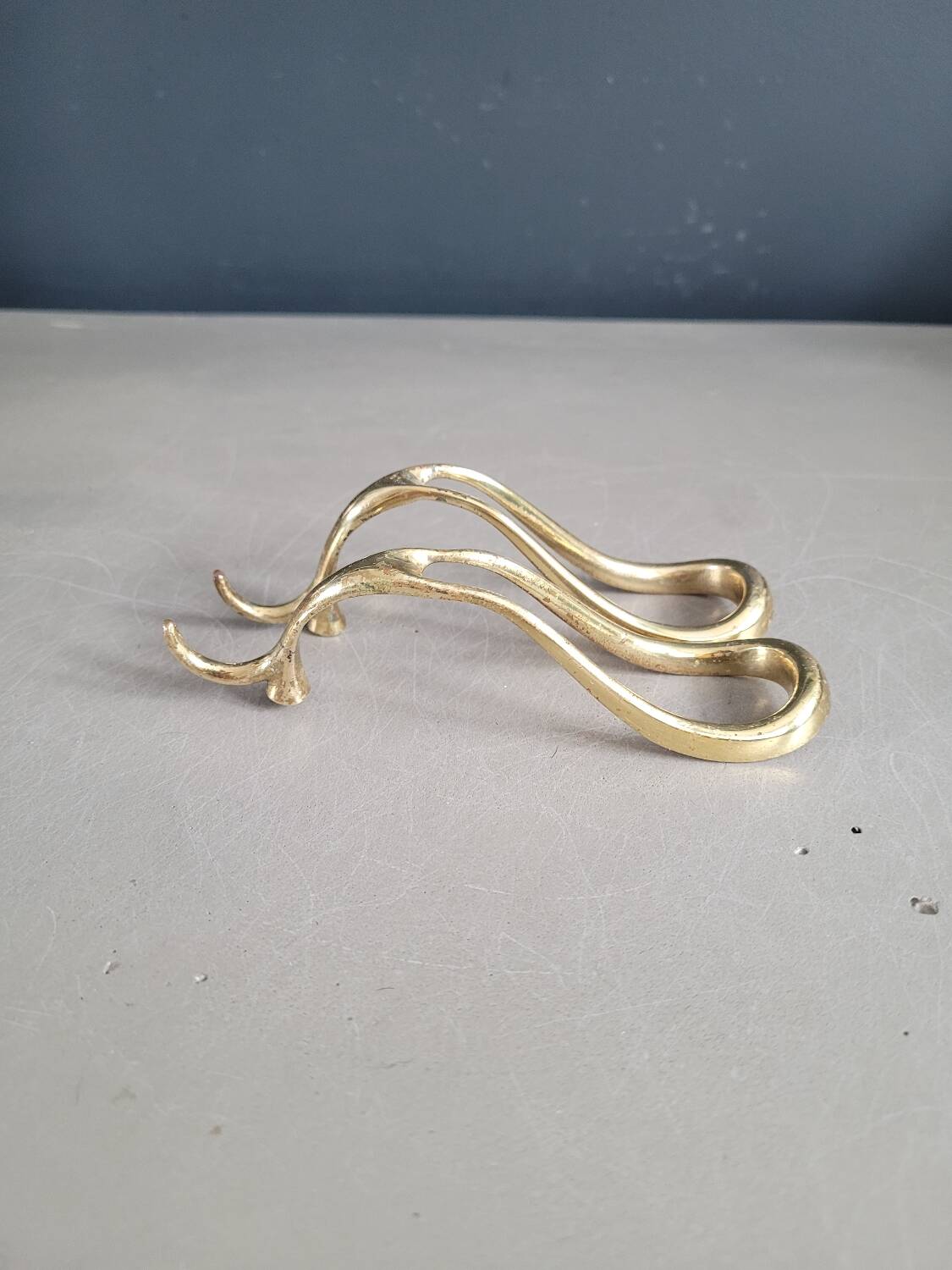 Antique brass pipe holder