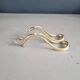 Antique brass pipe holder