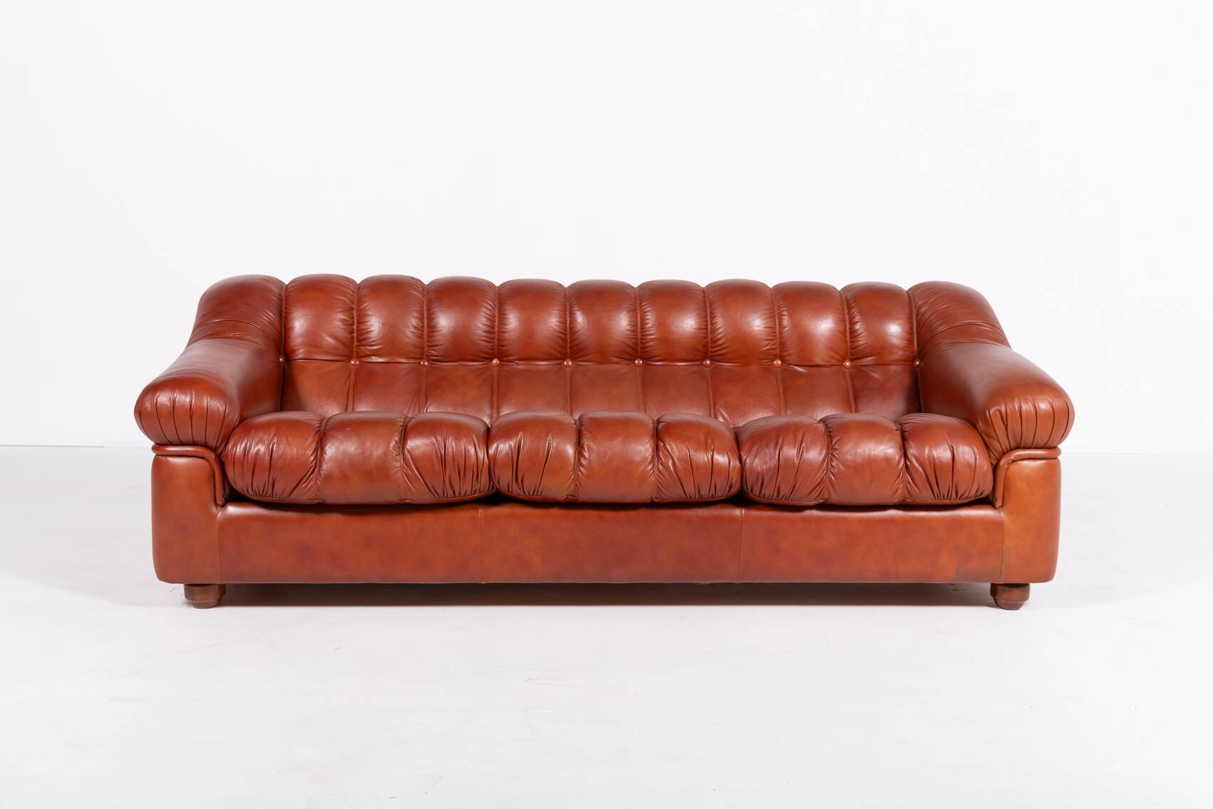Sculptural Italian Modern three seat leather sofa, 1970’s