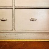 Solid wood sideboard with drawers.