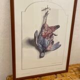 Table with poster "The Red Partridge"