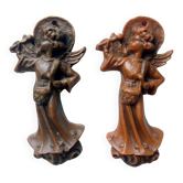 2 cherubs playing the drum