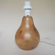Turned wooden lamp with linen shade