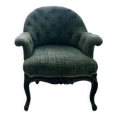 Antique buttoned green velvet armchair with patina and mahogany, a star of the 19th century.