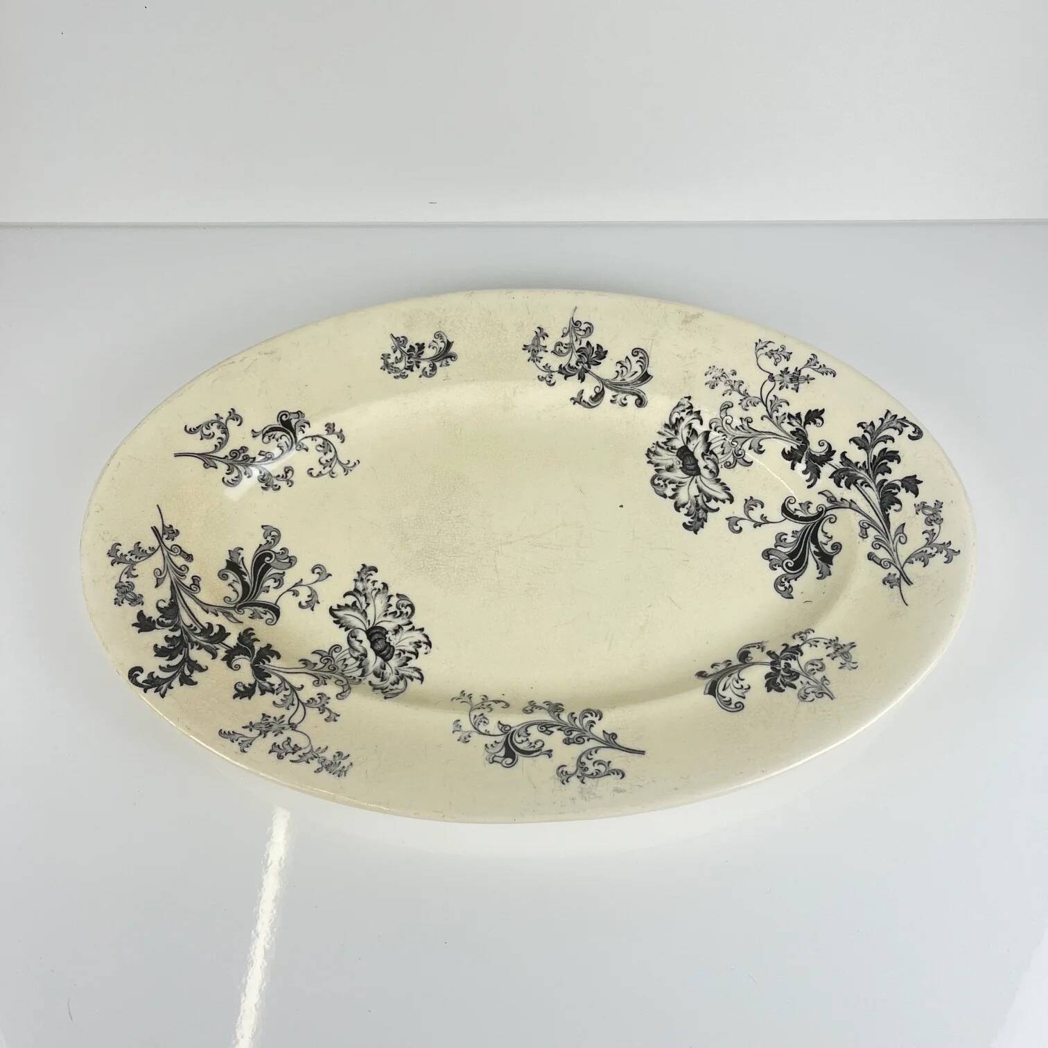 Large oval ironstone dish, "Damas" pattern by Sarreguemines, late 19th century, grey-black.
