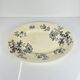 Large oval ironstone dish, "Damas" pattern by Sarreguemines, late 19th century, grey-black.
