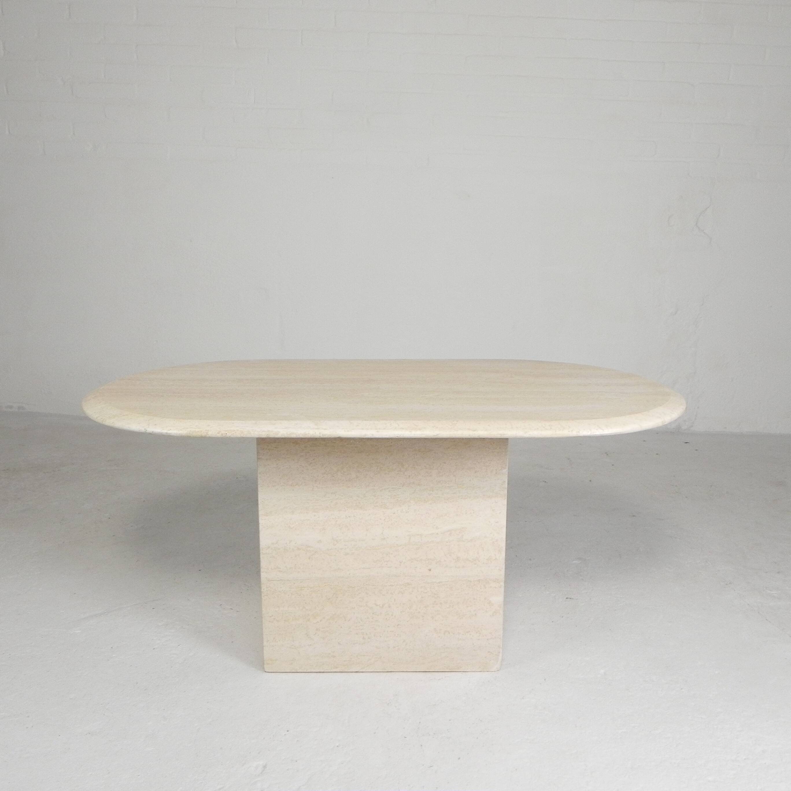 Mid-Century travertine coffee table with an oval top, 1970s.