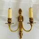 St Louis XVI gilded bronze wall lights with foliage and pine cone decorations