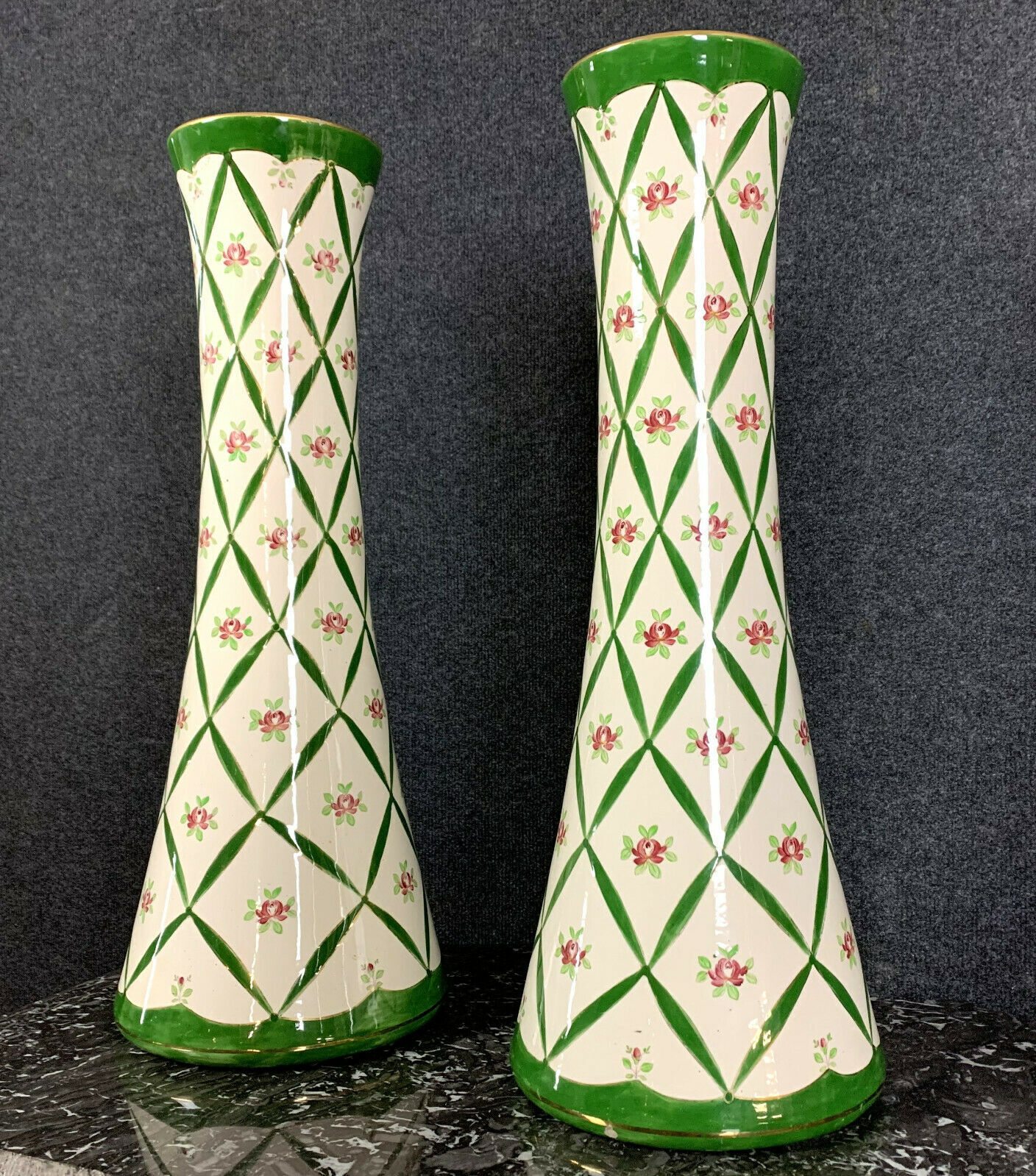 Pair of cornet vases in fine earthenware decorated with flowers in a green mesh