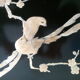 Panneau en bois laqué noir motifs d'oiseaux et de branches fleuries en ivoire et en nacre, fin XIX