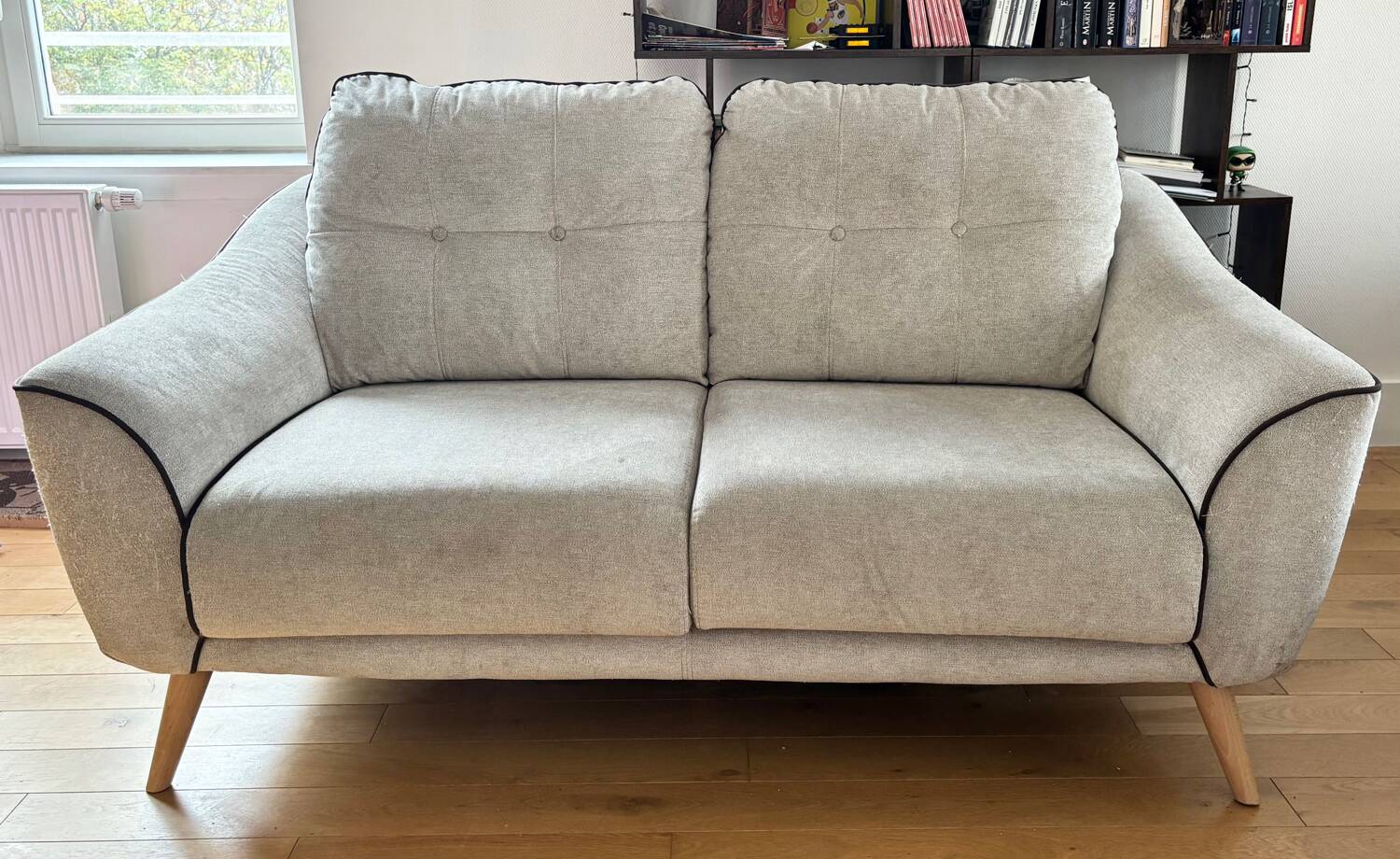 Grey two-seater sofa