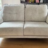 Grey two-seater sofa