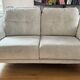 Grey two-seater sofa