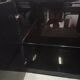 Black lacquered and brass design 70/80