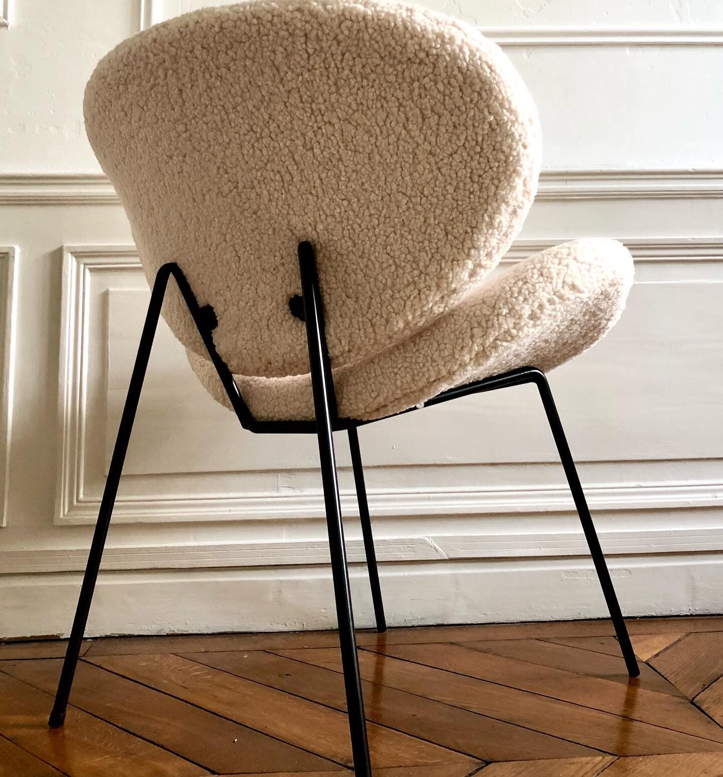 Contemporary design armchair in sheepskin