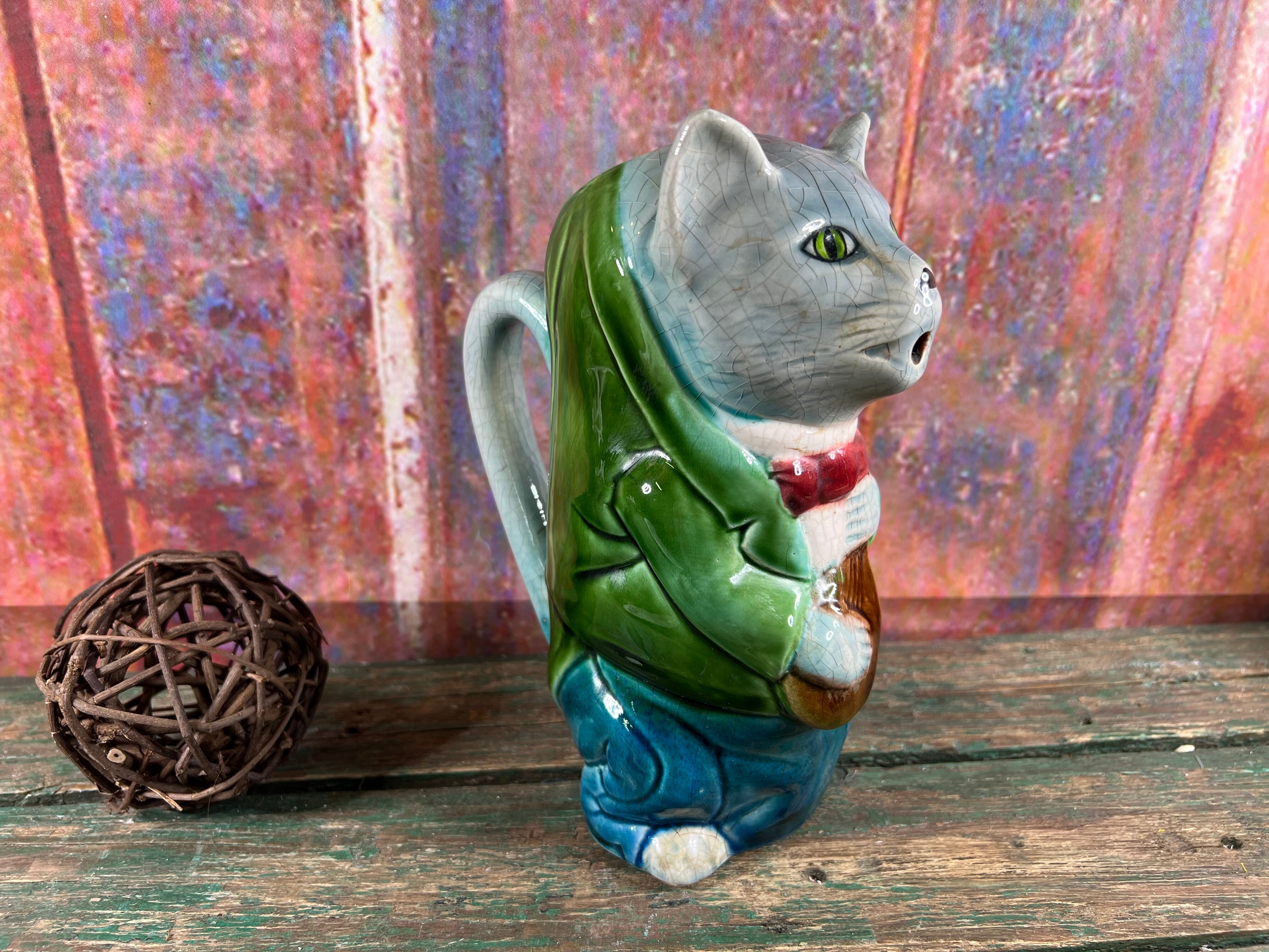 Pitcher slurry cat musician