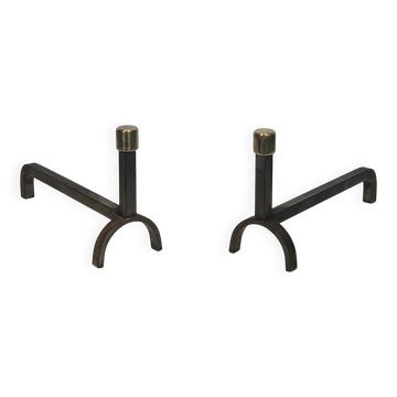 Pair of modernist fire dogs in wrought iron and brass