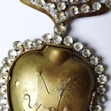 Ancient ex-voto of a flaming heart of Mary, adorned with rhinestones, 19th-20th century.
