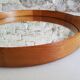 Round teak mirror by Uno and Osten Kristiansson for Luxus Vittsjö, Sweden.