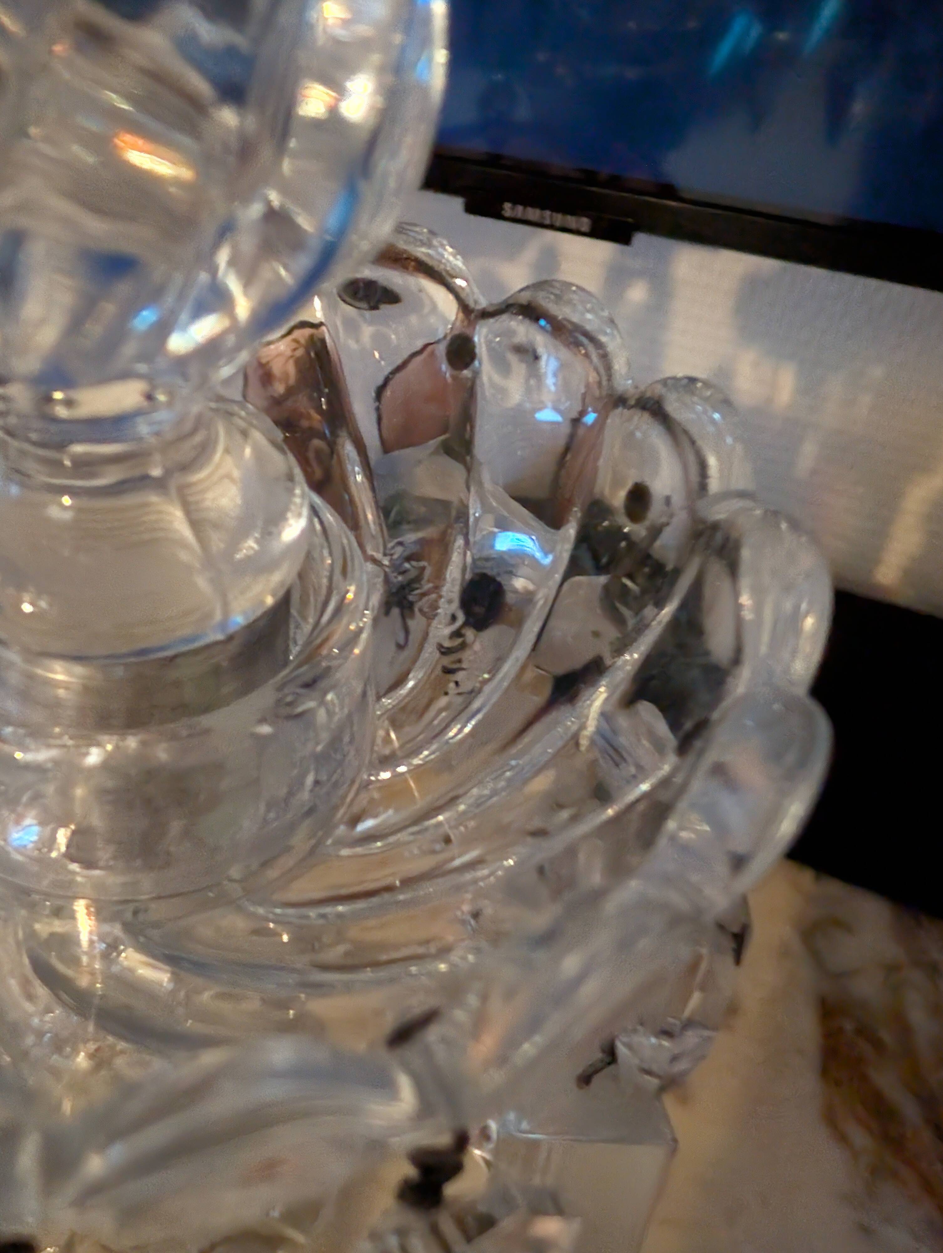 Two-light candelabrum in crystal with Baccarat pendants.