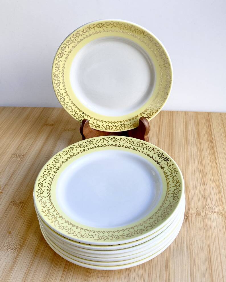 8 vintage yellow dessert plates