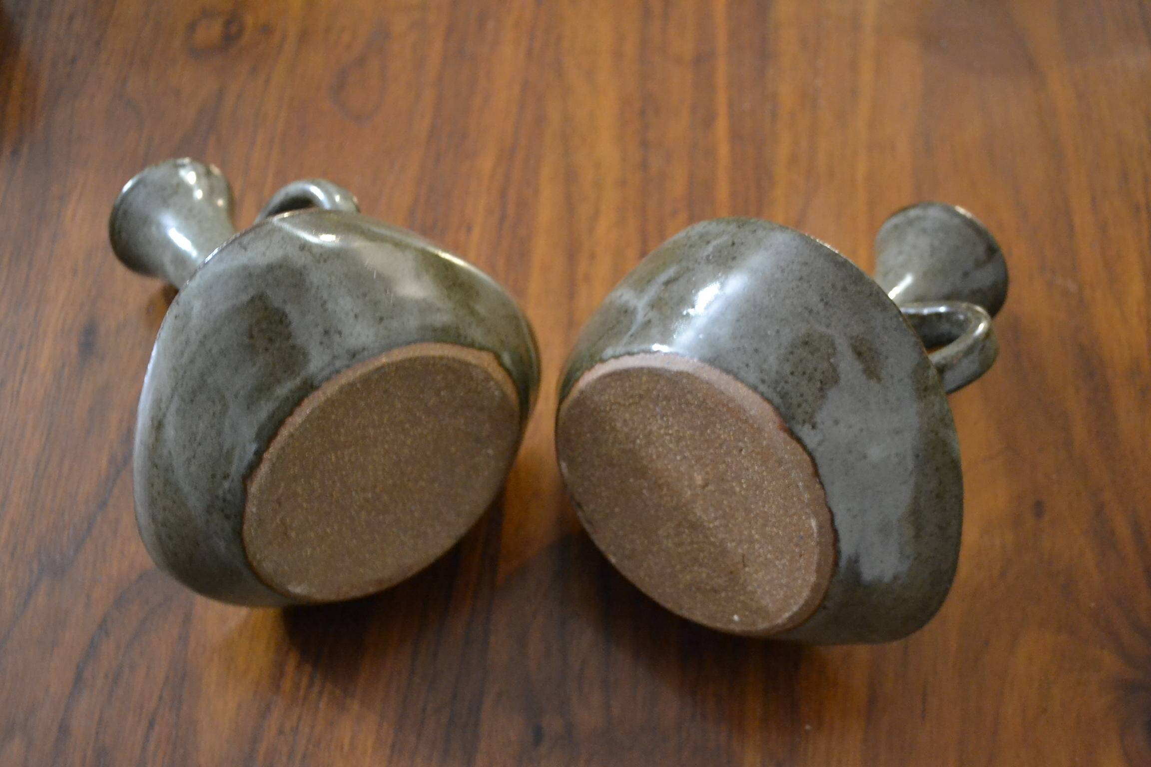 Set of 2 stoneware Cyclops candlesticks