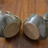 Set of 2 stoneware Cyclops candlesticks