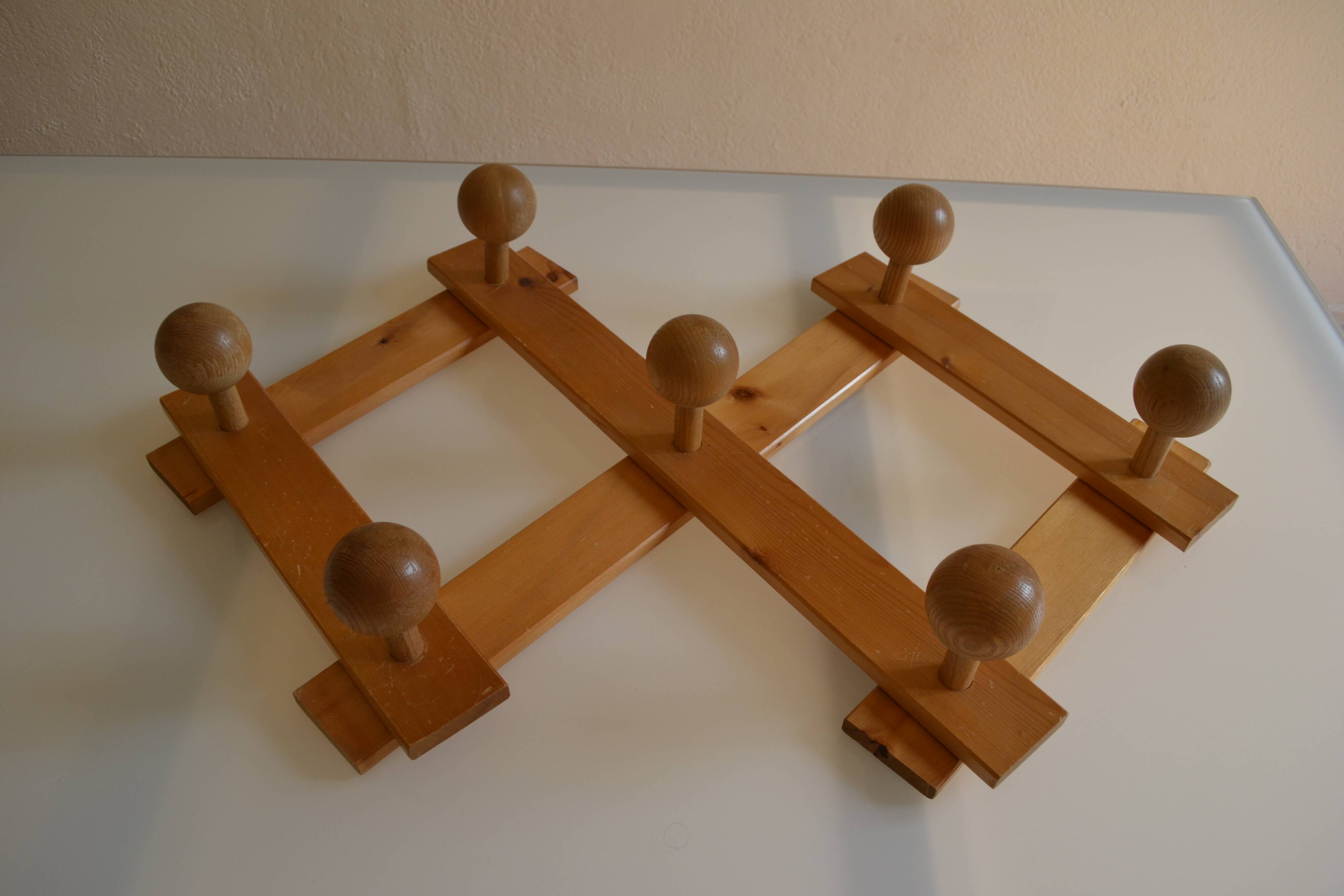 Brutalist wooden accordion wall coat rack with 7 hooks