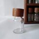 Wooden shelf with 32 vintage Cole & Mason spice jars