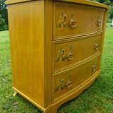 Old bohemian chest of drawers from the 30s with its floral prints in solid wood