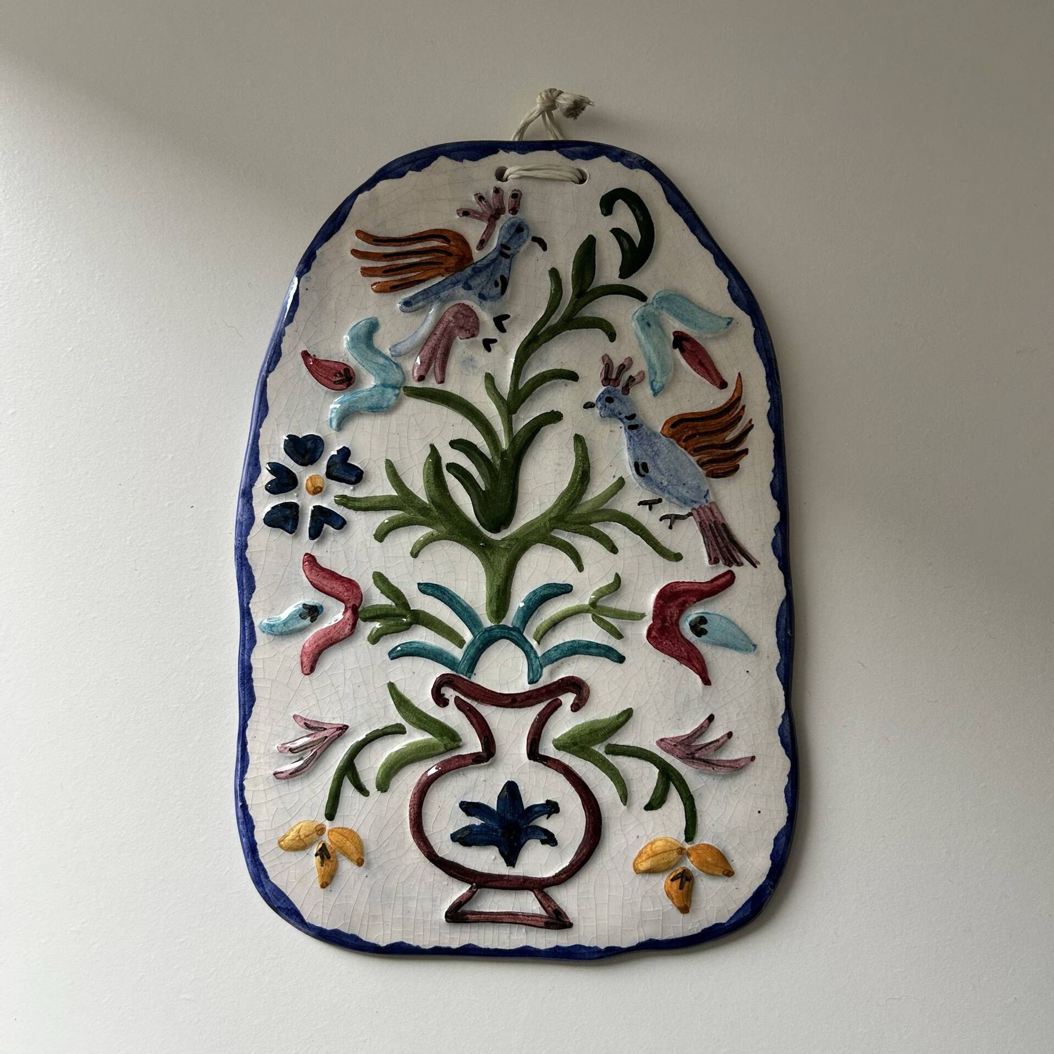 Ceramic plaque decorated with birds
