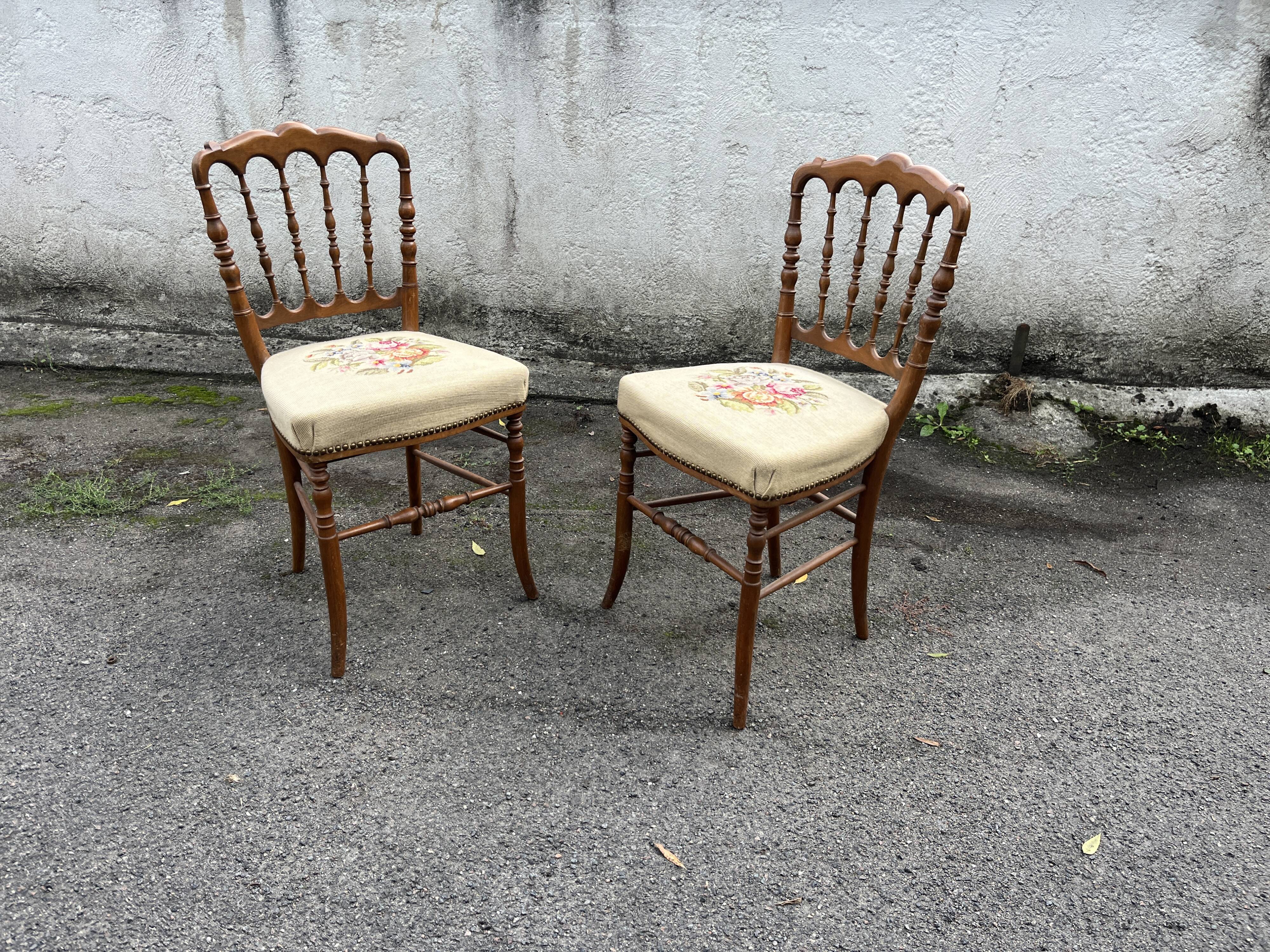 Pair of antique turned wooden chairs, embroidered upholstered seats