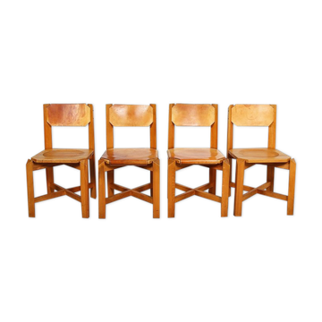Set of 4 dining chairs in elm wood and cognac leather.
