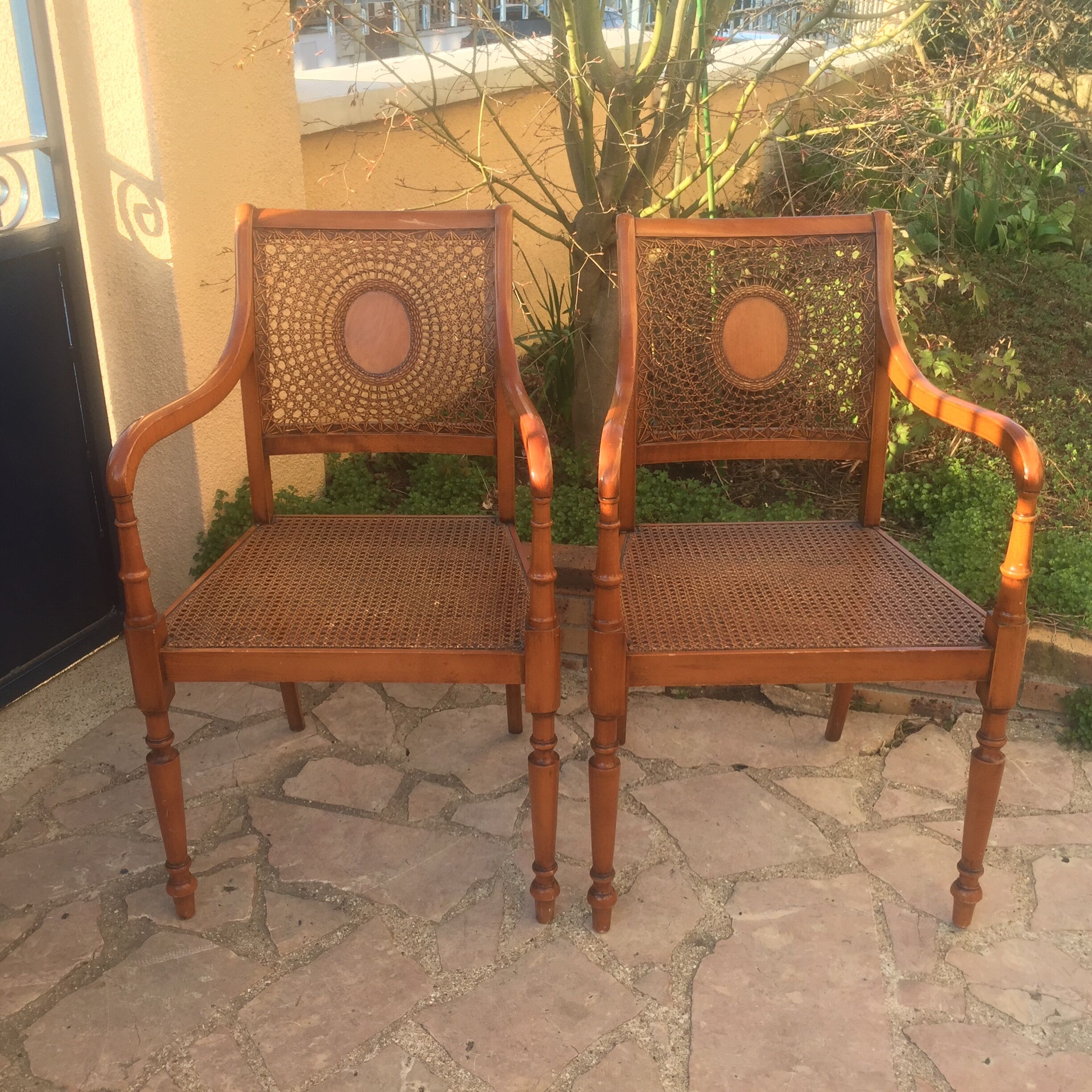 Pair of caned chairs