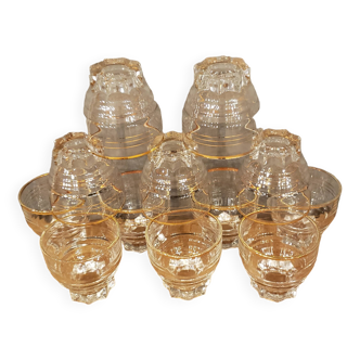 12 vintage glasses with star base and gold edging